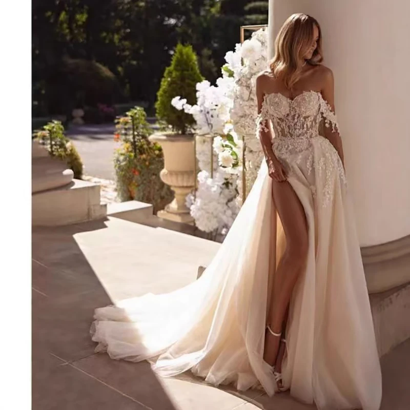 فساتين زفاف بسيطة مزينة بطيات عصرية مخصصة للشاطئ للنساء 2025 أنيقة على شكل حرف a طول الأرض مفتوحة الظهر فساتين بريدا #1