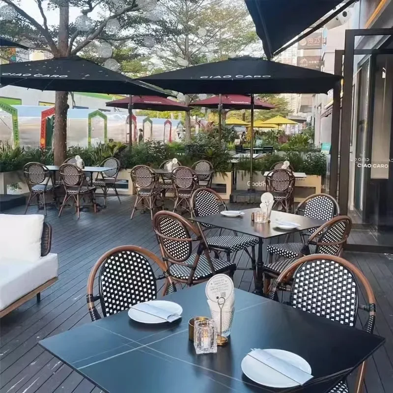 Outdoor French tables and chairs Balcony rattan chairs rattan chairs three-piece cafe milk tea shop homestay outdoor retro dinin