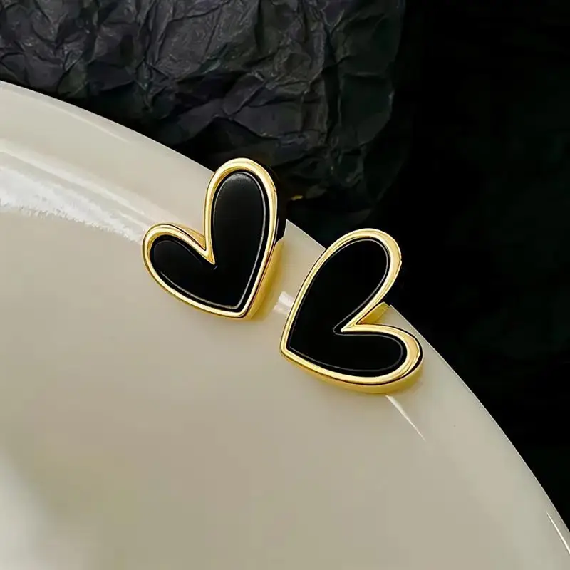 Huitan, elegantes pendientes con forma de corazón de Color dorado para mujer con esmalte negro, accesorios elegantes para boda y compromiso, regalo de joyería de moda