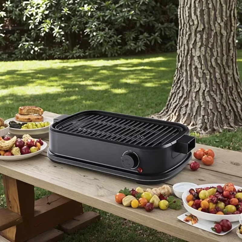 

Portable non-stick electric grill with removable pan for easy cleaning of smokeless grills