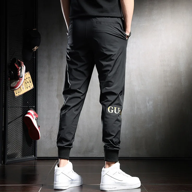 سراويل رياضية مطبوعة عصرية للرجال في الصيف، رفيعة للغاية، مرنة، قابلة للتنفس، سراويل كاجوال عصرية للشارع