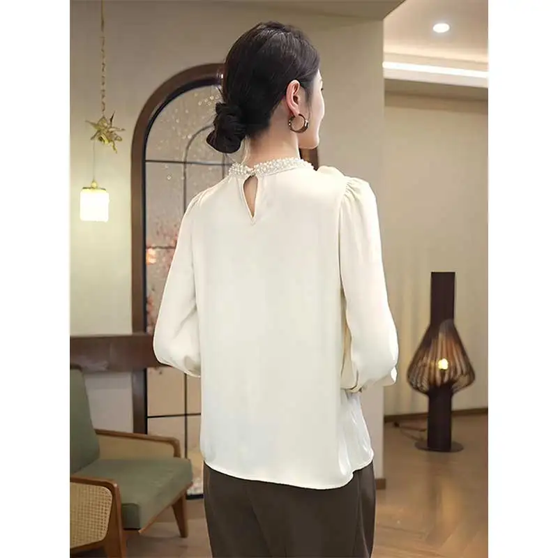 เสื้อผ้าผู้หญิง แฟชั่นฤดูใบไม้ผลิและฤดูใบไม้ร่วง สไตล์เกาหลี ลายฉลุ สีพื้น คอกลม เสื้อผู้หญิงทำงาน เรียบง่าย แขนยาว ผ้าแจ็คการ์ด