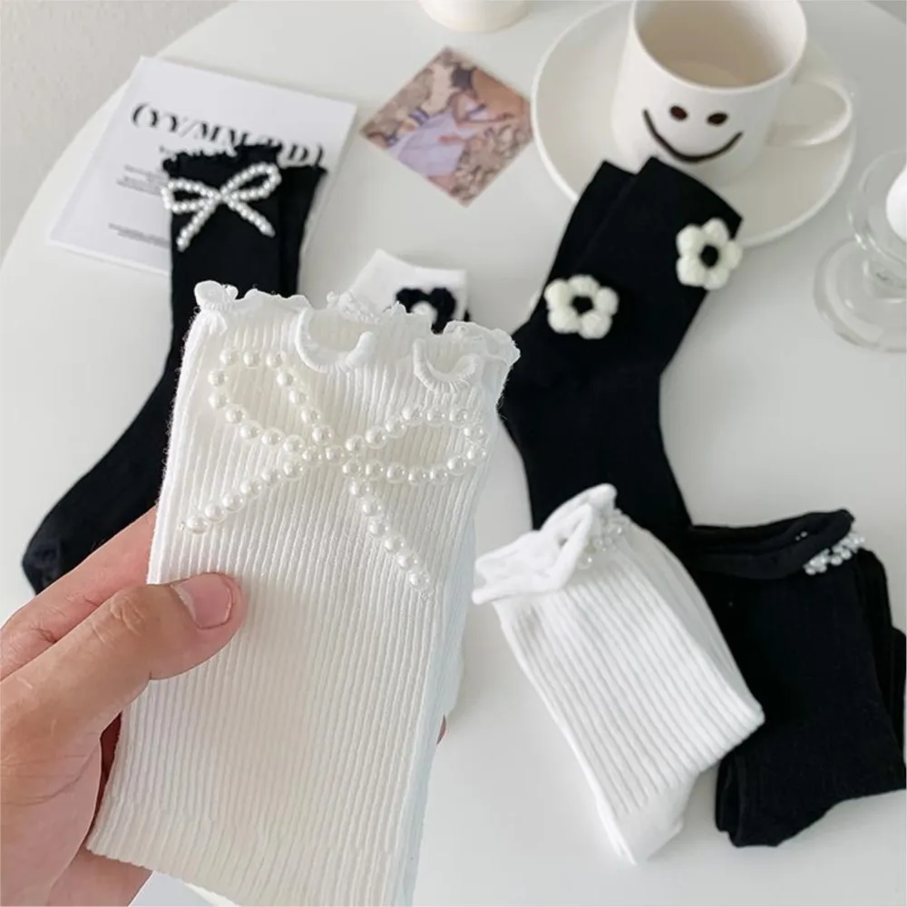

Spring and autumn black and white JK women's socks women's stockings Pearl bow Lolita stockings three-dimensional wool flowers.