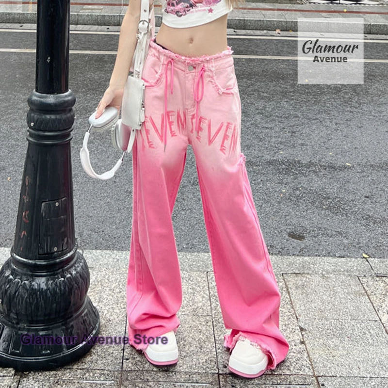

American retro dopamine pink hole jeans female summer new fashion temperament drawstring design loose slim wide-leg pants.