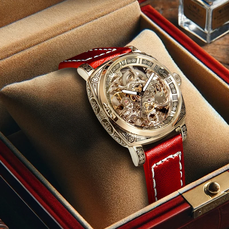 

A men's vintage luxury-style skeleton pentagram gold-engraved red PU leather mechanical watch