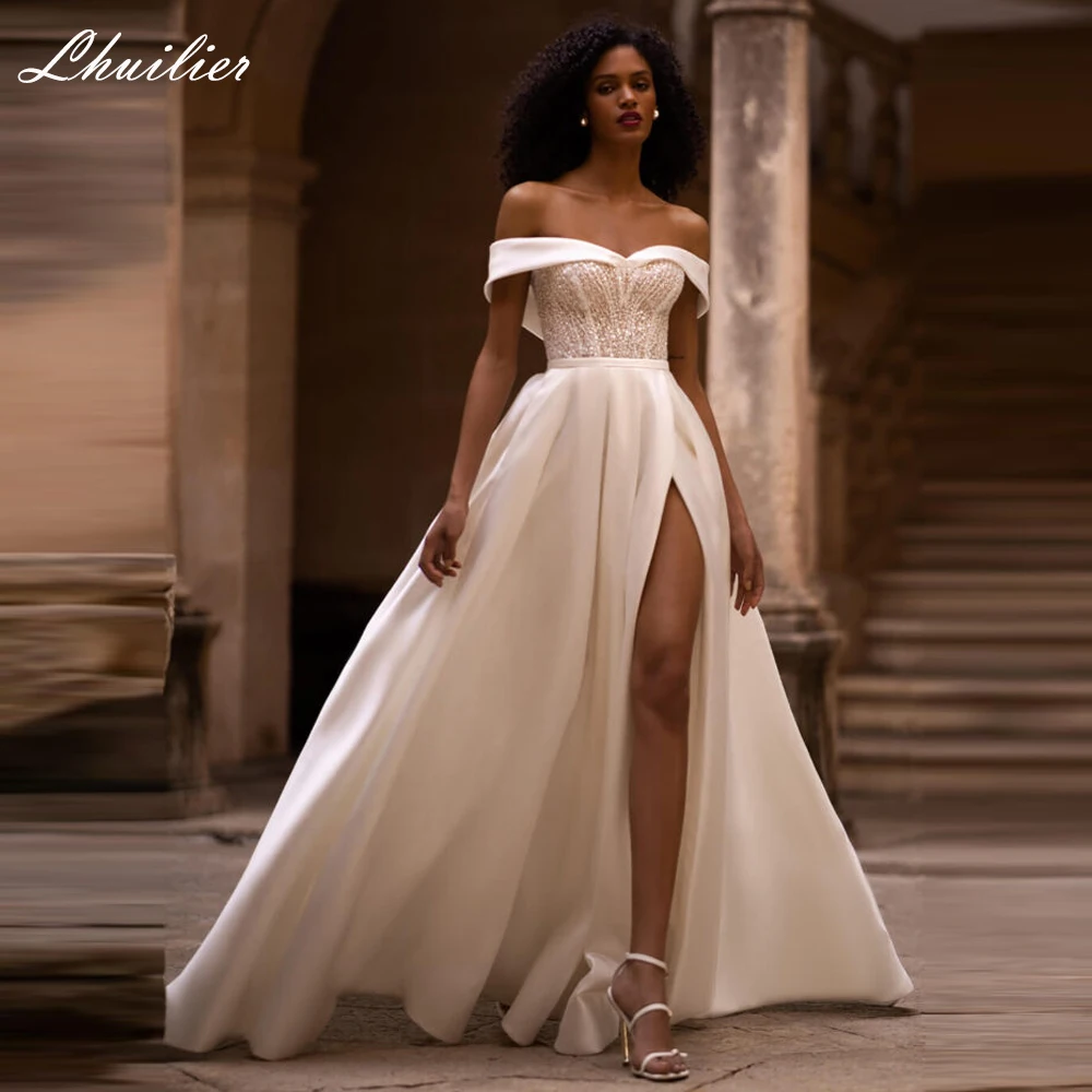 

Lhuilier Customized A Line Boat Neck Satin Wedding Dresses Pearls Beaded Bridal Gown with High Slit
