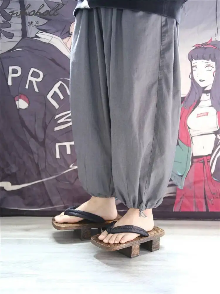 Japońskie drewniane geta męskie kapcie, dwuzębne chodaki na platformie, sandały, buty do cosplayu samurajów, damskie i męskie klapki z grubą podeszwą.