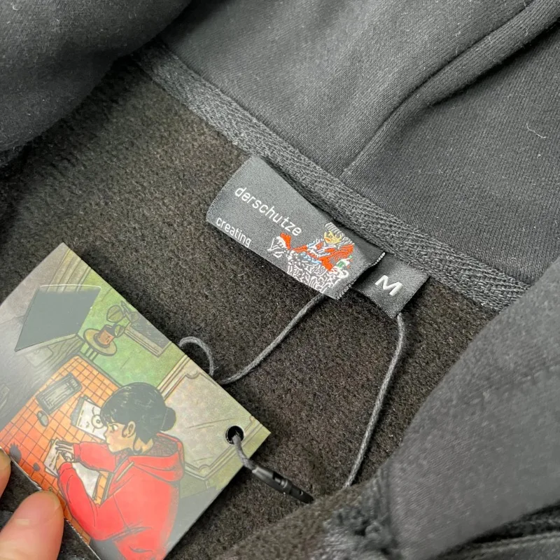 سترة صوفية بغطاء للرأس سوداء من القطن الخالص من Derschutze مطرزة بسحاب غربي كاجوال