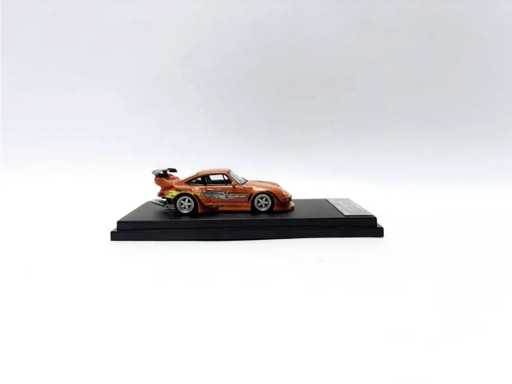 In Stock Street Warrior 1:64 RWB 993 Diecast Model Car. Vibrant orange finish with custom flame graphics, iconic widebody design