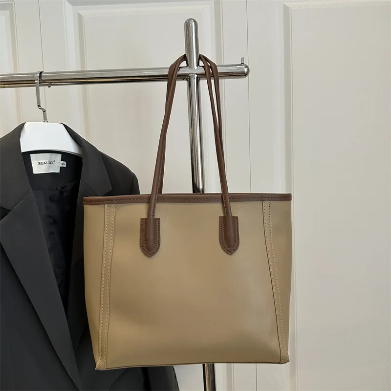 

2026 vintage new style atmospheric commuting texture casual solid color temperament tote single shoulder armpit handbag
