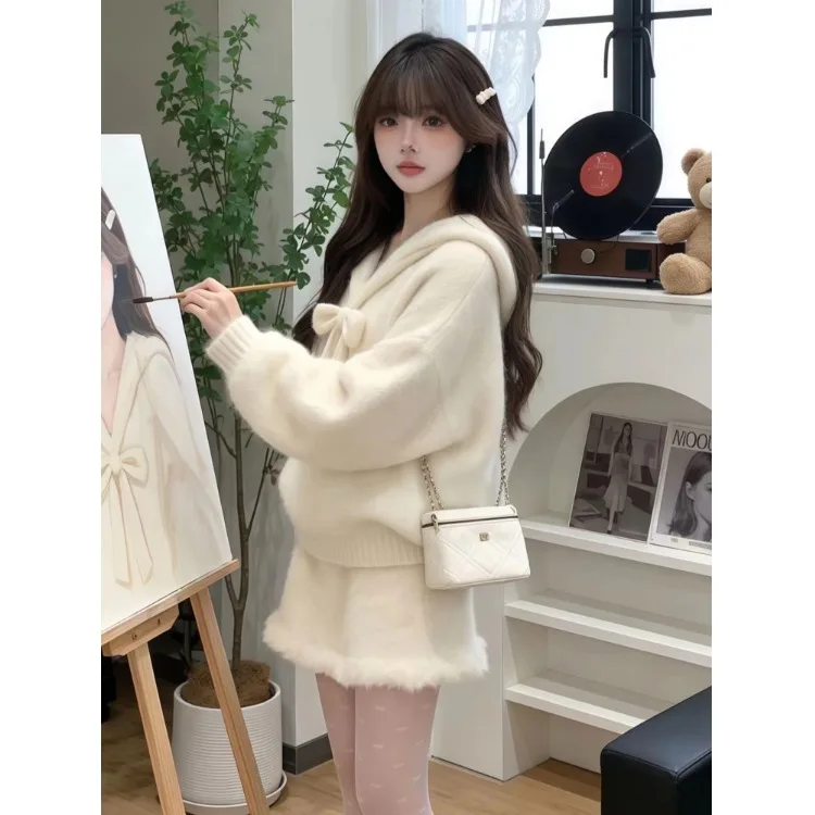 Ele الشتاء الزي المرأة الجديدة 2026 الأبيض ربطة عنق محبوك سترة وتنورة مجموعة Faionable تنفس البوليستر