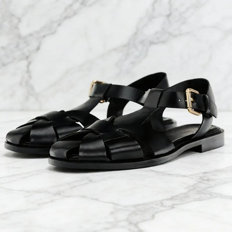 

Удобные черные кожаные сандалии без каблука для женщин, роскошные, с ремешком на щиколотке, металлической пряжкой, дизайнерские, летние, сексуальные, ажурные, пляжные