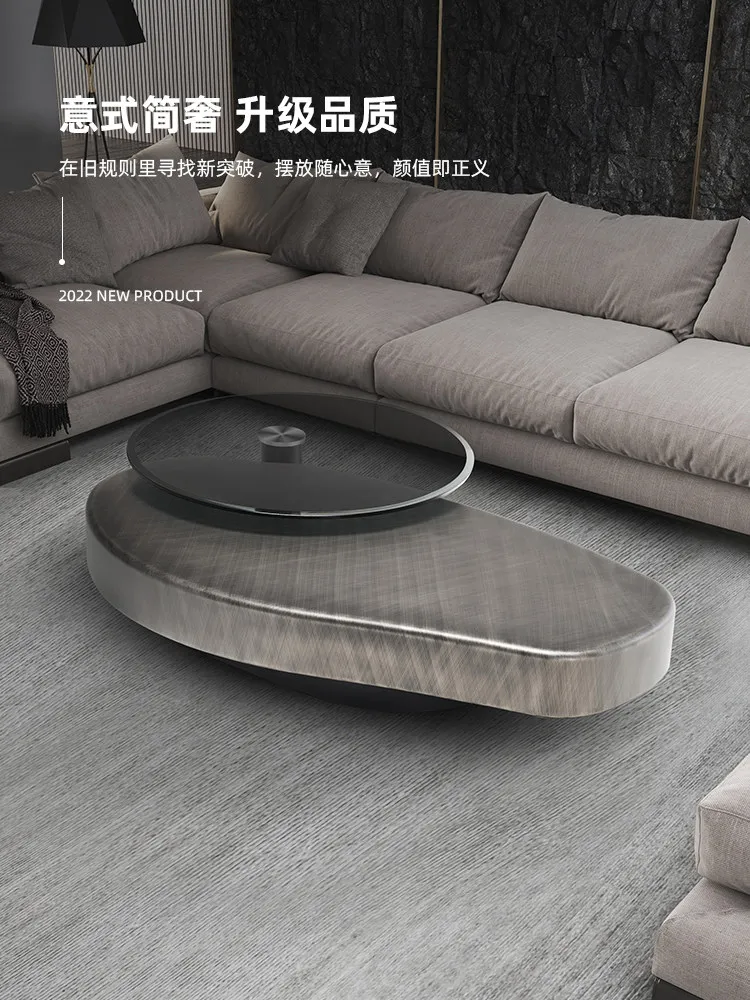 The coffee table is minimalist, advanced, round, bronze, living room, light luxury, modern brushed stainless steel coffee table