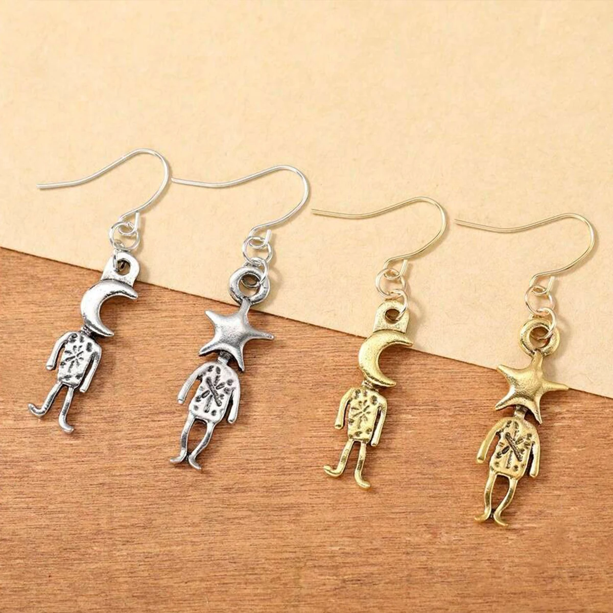 1 paar gouden kleur en zilverkleurige retro ster- en maanvormige oorbellen creatieve asymmetrische damesoorbellen sieraden