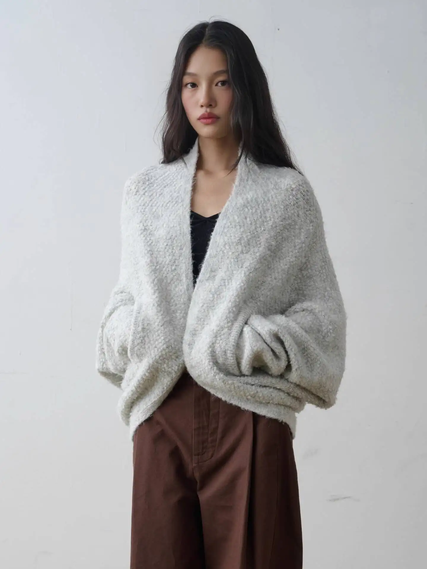 

women knitting cardigan 2026 spring Textured Bouclé Wool knit Cardigan Women's Oversized Batwing Sleeve Loose Slim Fit Outerwear