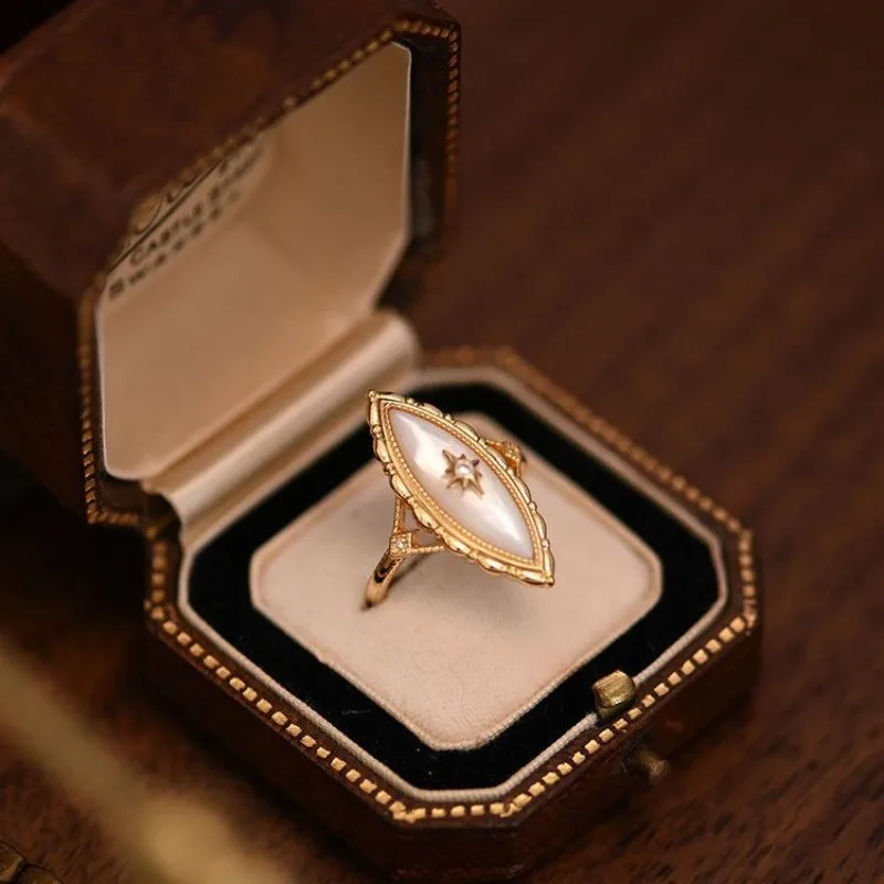 Light Luxury Design Sense Ancient Gold Craft Court style horse-eye pointed White Fritillaria rings for women Vintage Jewelry