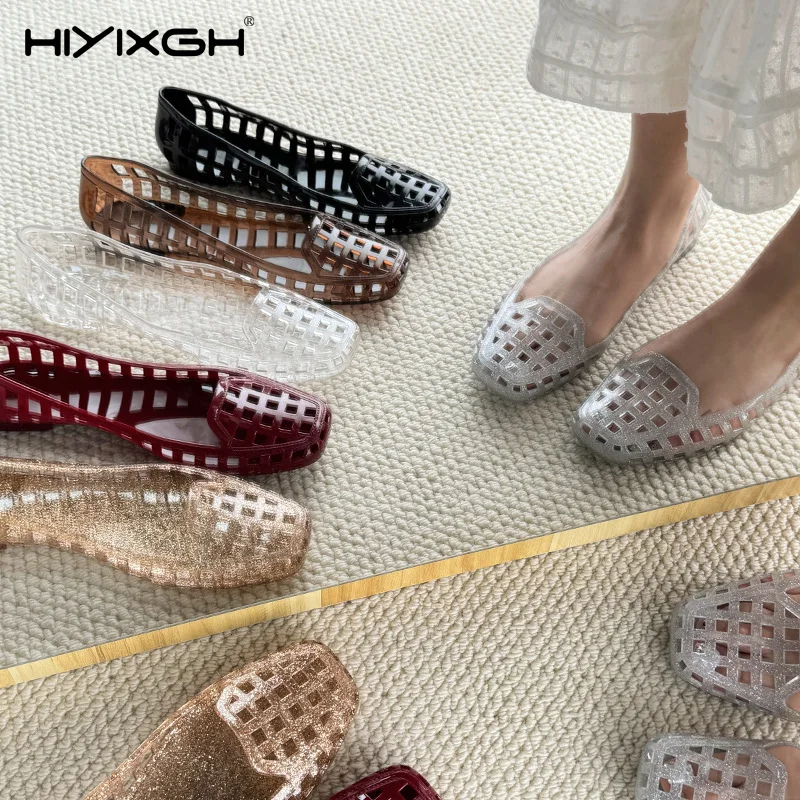 

Shallow mouth jelly single shoes with square toe hollowed out crystal shoes, wearing flat sandals with one foot, women's sandals
