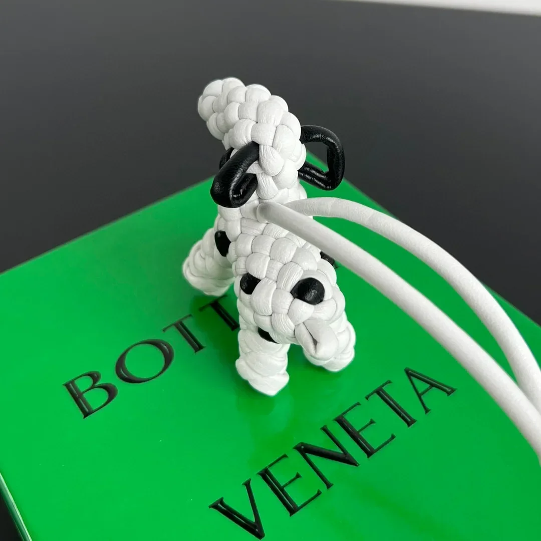 

Artisan Braided Leather Key Ring with Premium Dog Figurine Pendant Luxury Pet Lover's Gift Collection