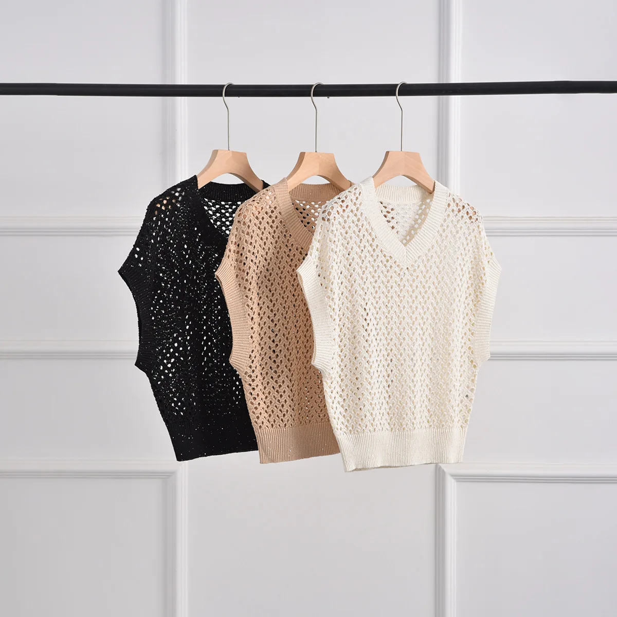 

Women's Knitted Sweater Hollow Out V-Neck Short Sleeve Solid Color Loose Female Vest