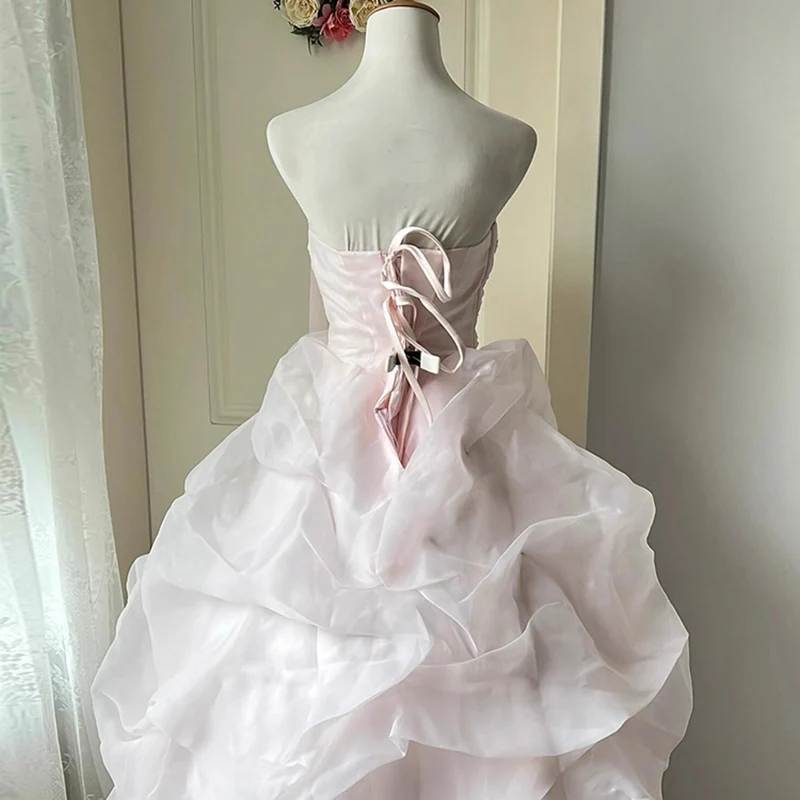 AnXin SH เจ้าหญิงดอกไม้สีชมพูลูกไม้เกาะอกแขนกุดประดับด้วยลูกปัดมุกโบว์รัฟเฟิลบอลชุดผูกเชือกชุดแต่งงานที่กำหนดเอง