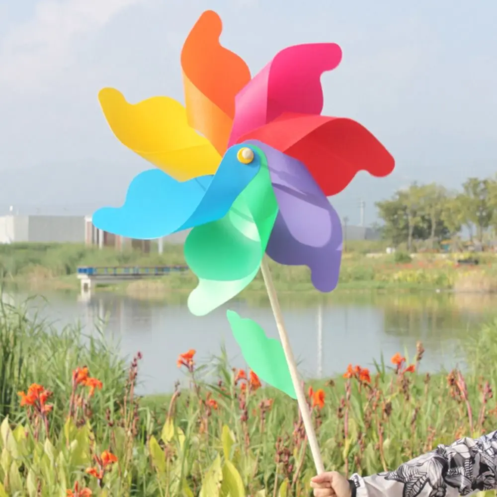 Giocattoli per bambini di qualità per la casa giardino girandole in plastica layout girandole giocattoli girasole colorati mulini a vento girandole fai da te