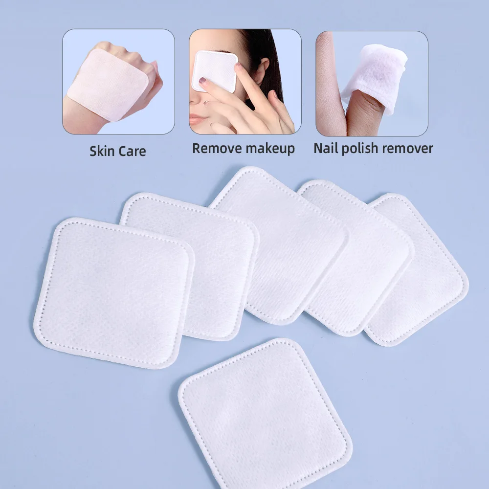 柔らかく通気性のある正方形のメイク落としパッド 100 枚、両面テクスチャードコットンパッド、スキンケアや洗顔に使用されます。