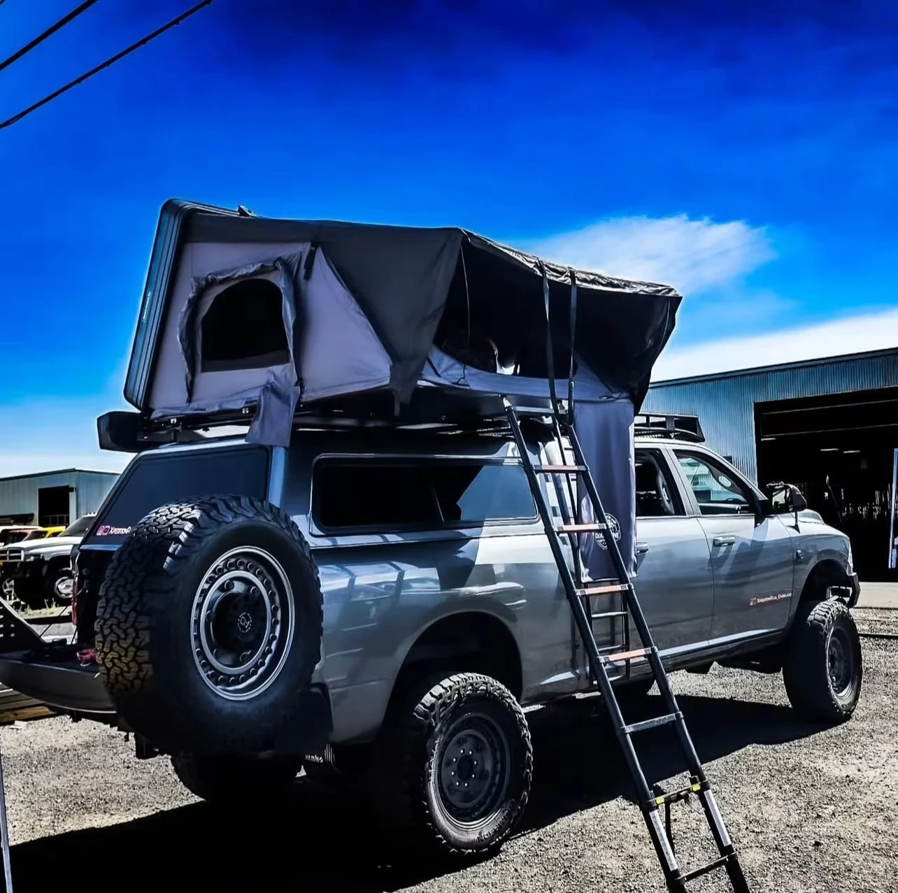 

Factory Price Light Weight Triangle Rooftop Tent 4X4 Off-Road Car Outdoor Camping Top Camp Roof Tents for sale to Europe