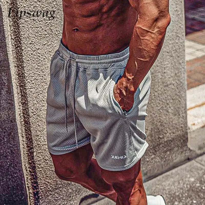 

New Casual Mens Drawstring Shorts Summer Sports Training Breathable Quick-dry Loose Shorts Men Daily Leisure Solid Color Shorts