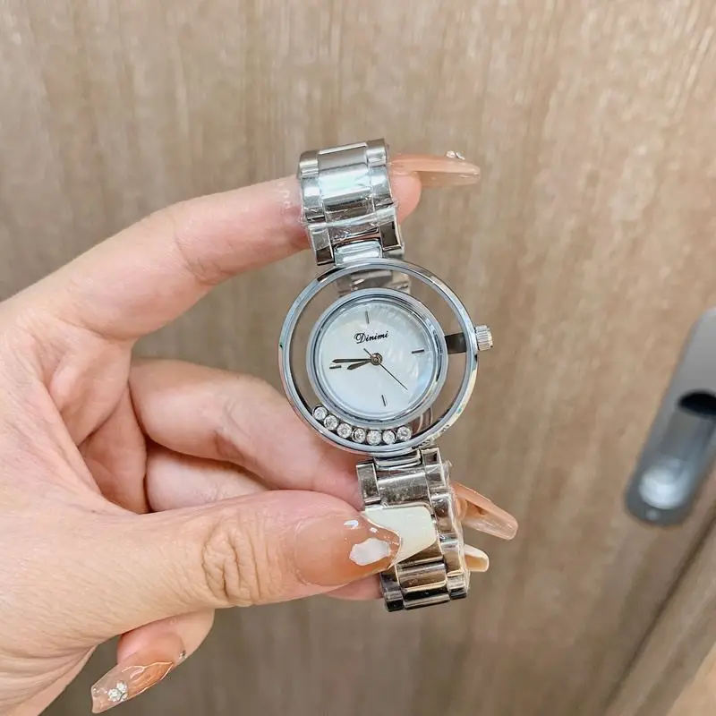

New light luxury trend quartz women's watch fashion hollow high-end mother-of-pearl watch watch accessories women's gift