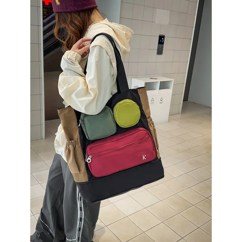 

Two-tone foldable travel bag for women, simple handbag, shoulder bag for college students, men's large-capacity commuter and gym