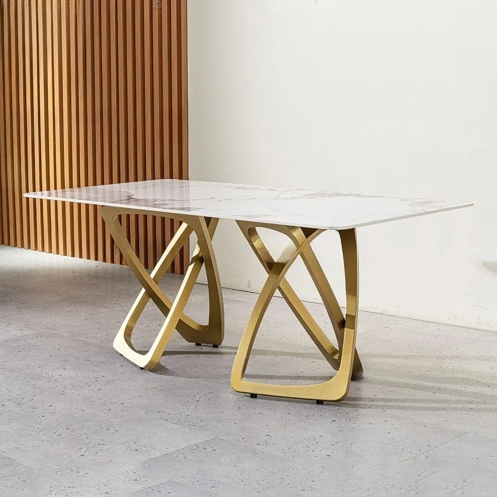 Light luxury rock slab dining table New modern high-end household rectangular high-end gold Italian designer dining table