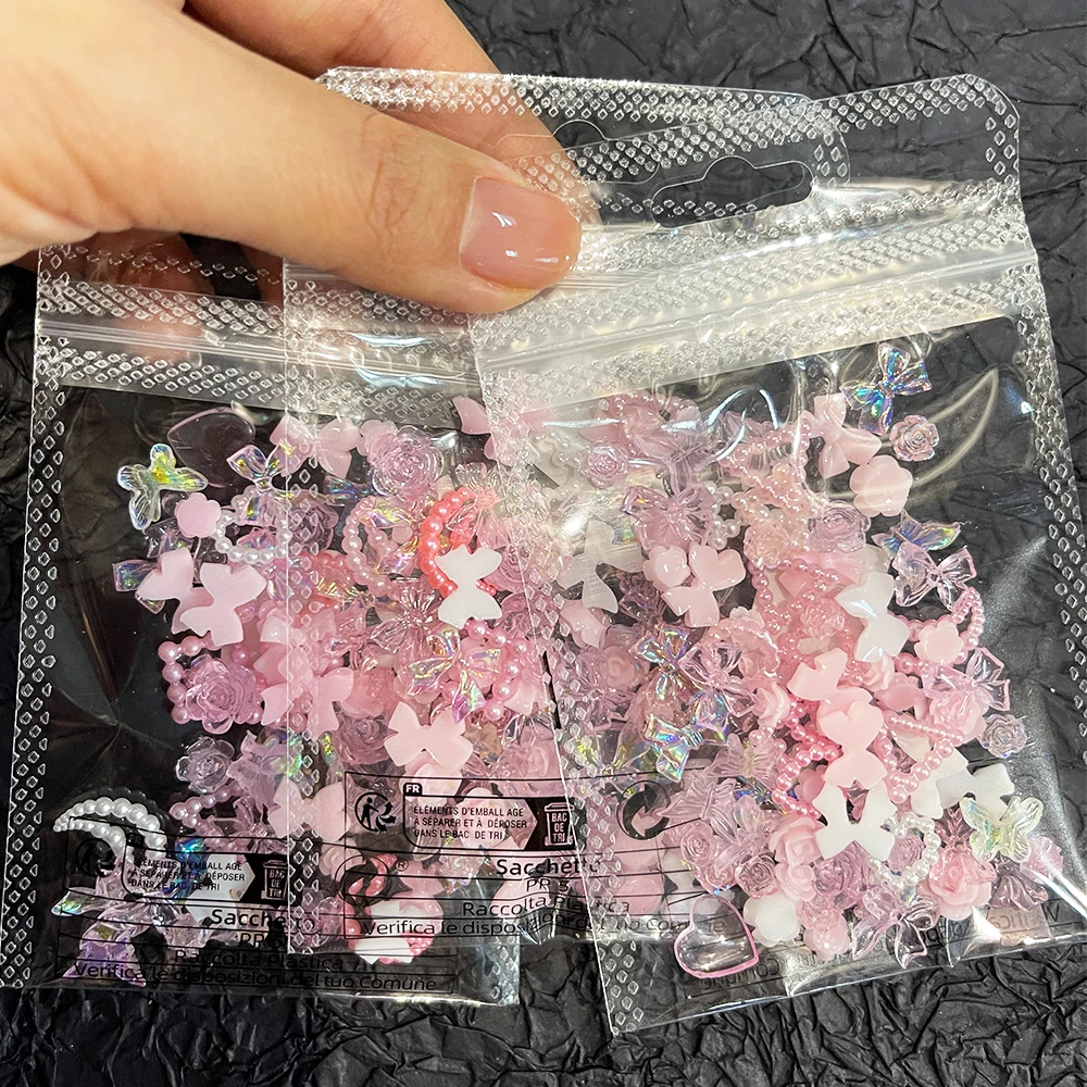 50Pcs Pearl Pink Bowknot Heart Shaped Rhinestones Mixed Nail Decorations Kawaii Flowers Butterfly Charms DIY Nail Accessories