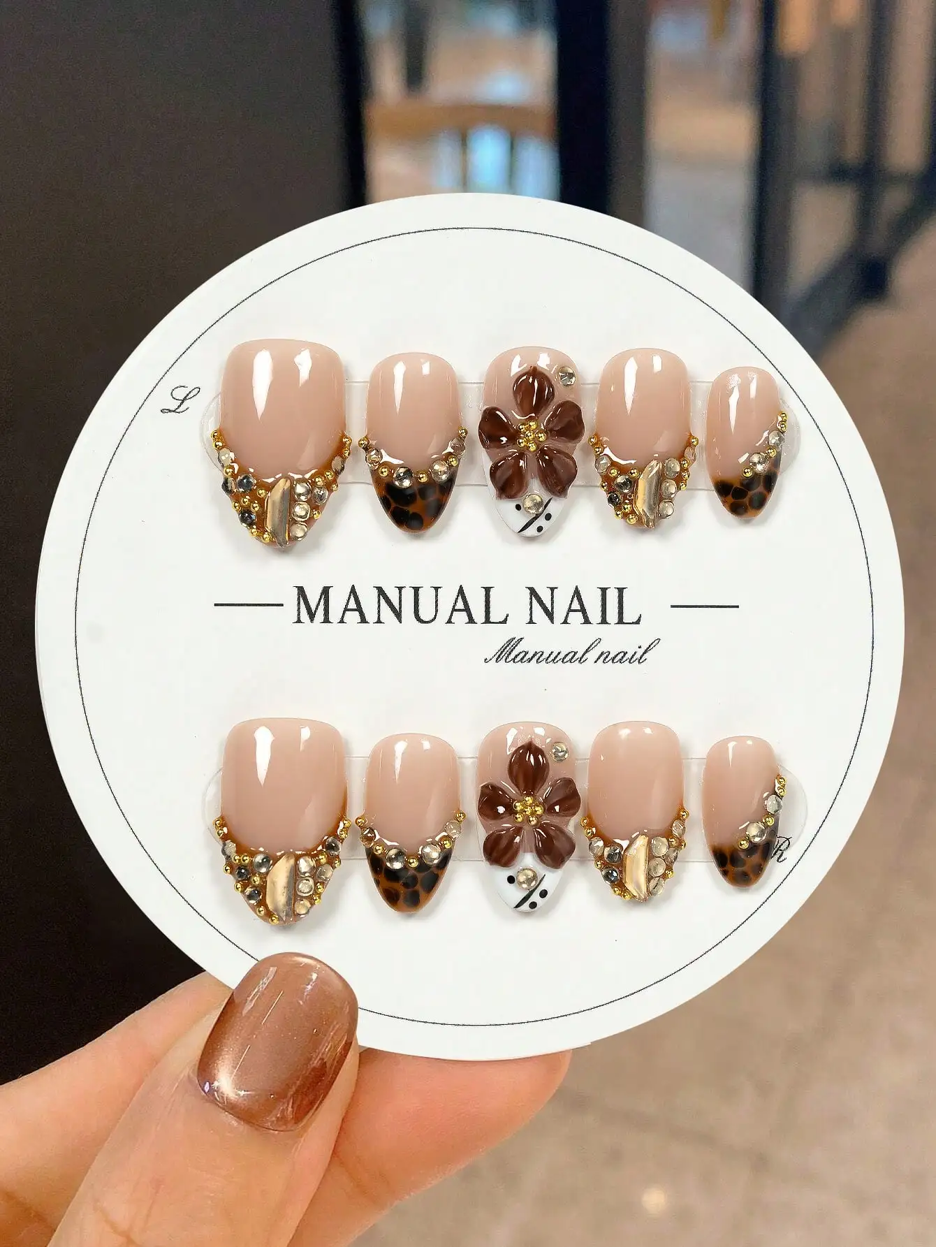 

10pcs Handmade Short Almond Matte Pink Nail Stickers, Pointed Tip, 3D Brown Floral, Hand-Painted Leopard Print, Gold & Crystal Decor. Fashionable & Luxurious Look. Press On Nails.