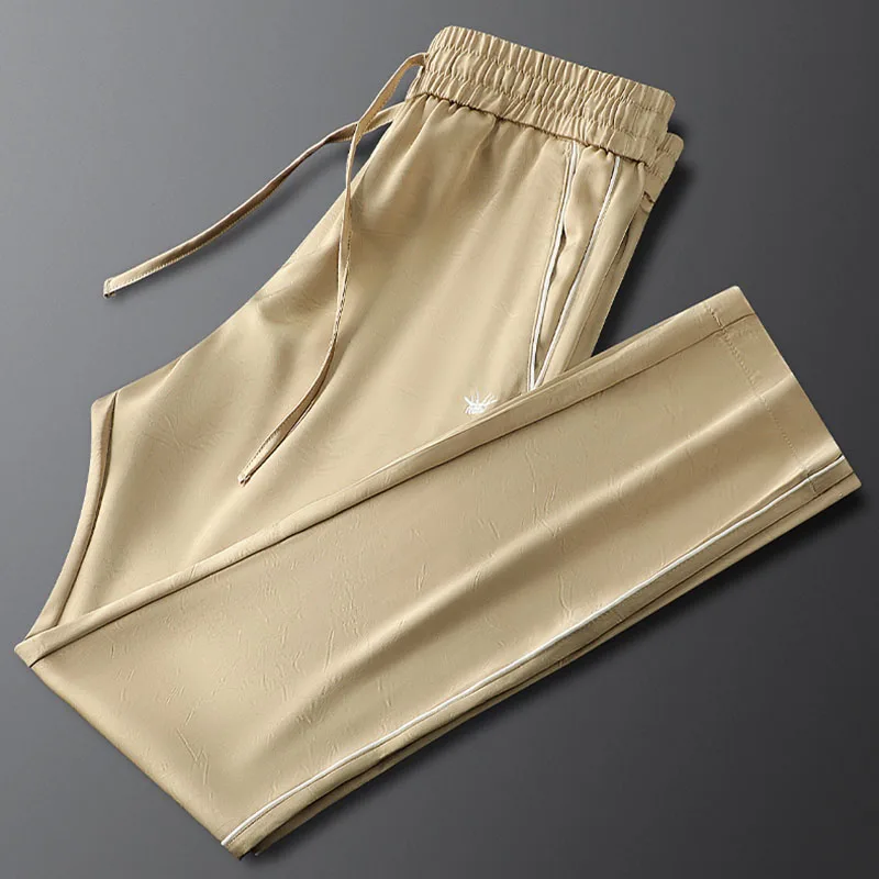 

New summer khaki casual sports pants men slim feet men's polyester sweatpants
