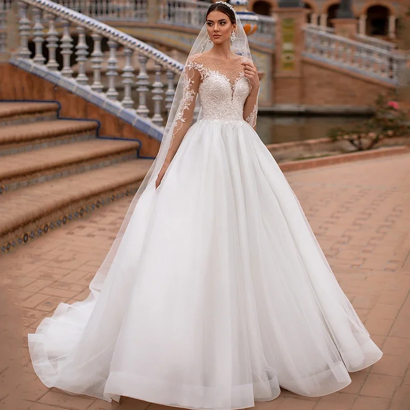 2024 Elegant Ball Gown Wedding Dresses O Neck Long Sleeve Beads Lace Bridal Dress Princess Church Wedding Gowns Illusion