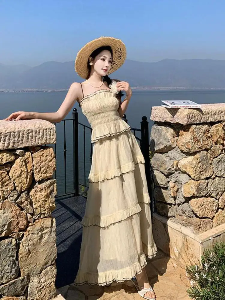 

Two Piece Set Women Summer Beige Fashion Sexy Sleeveless Backless Slip Tops And High Waist Slim Party Ruffles Pleated Long Skirt