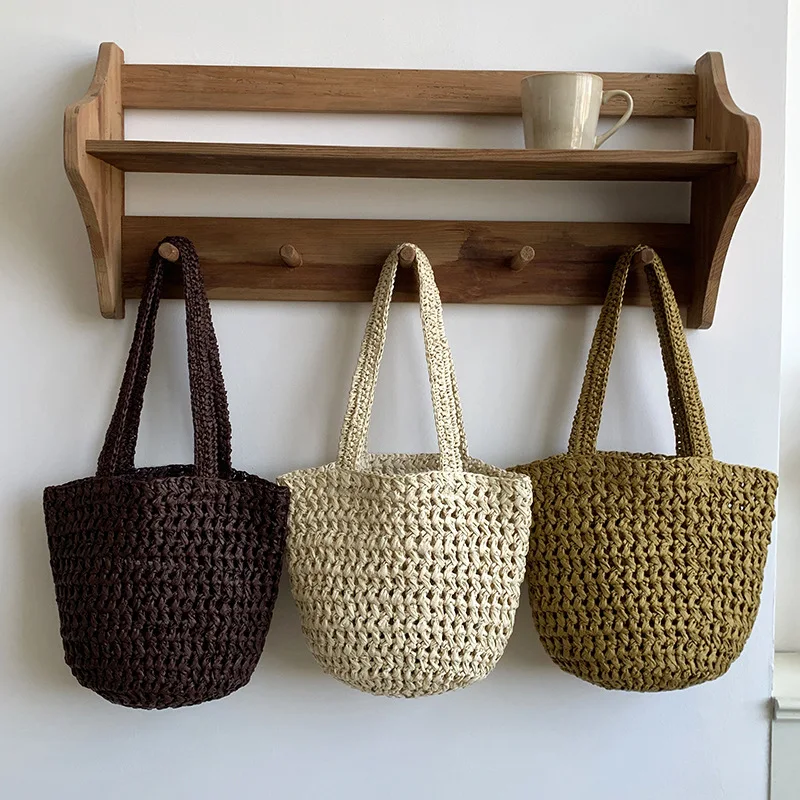 

2026 Simple New Raffia Handwoven Straw Bag Large Capacity Hollow Out Single Shoulder Underarm Bag Holiday Beach Tote Bag Female