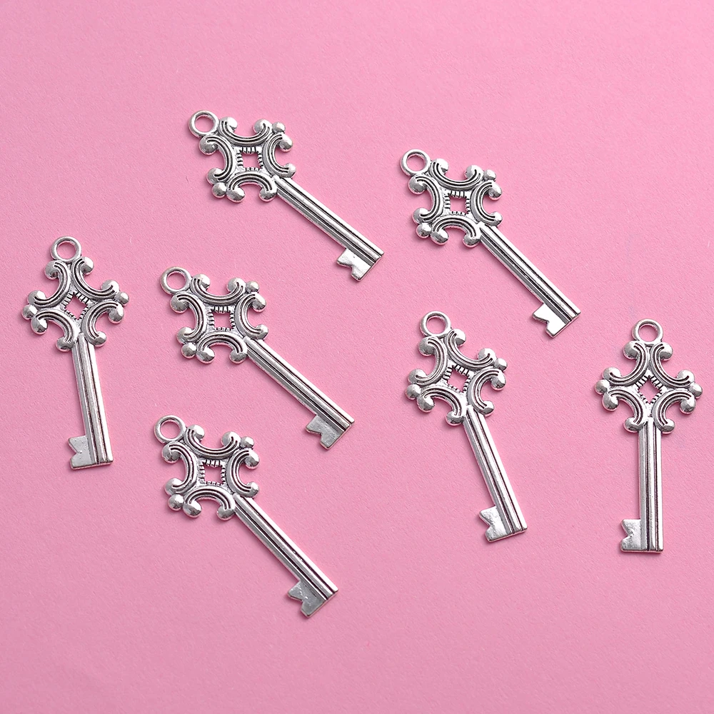 10 Pieces of Vintage-Style European Pattern Key Pendants with a Single Hole, Featuring Retro Key Pattern Designs, with a Hanging Loop at the Top, Suitable for DIY Bracelets, Earrings, Necklaces, and Niche Handmade Beading Accessories