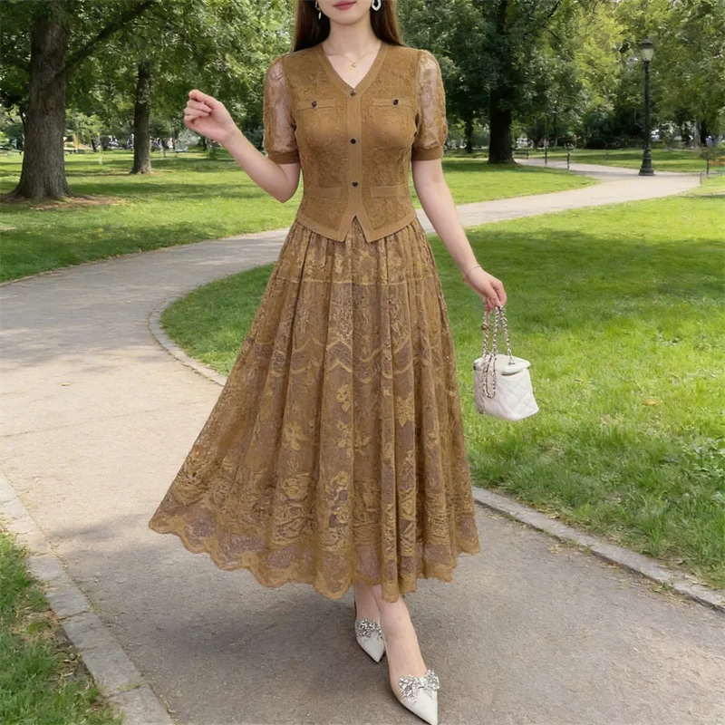 

Miyake pleated dress women's 2026 new fashion lace splicing fake two-piece V-neck short-sleeved elegant mid-length skirt