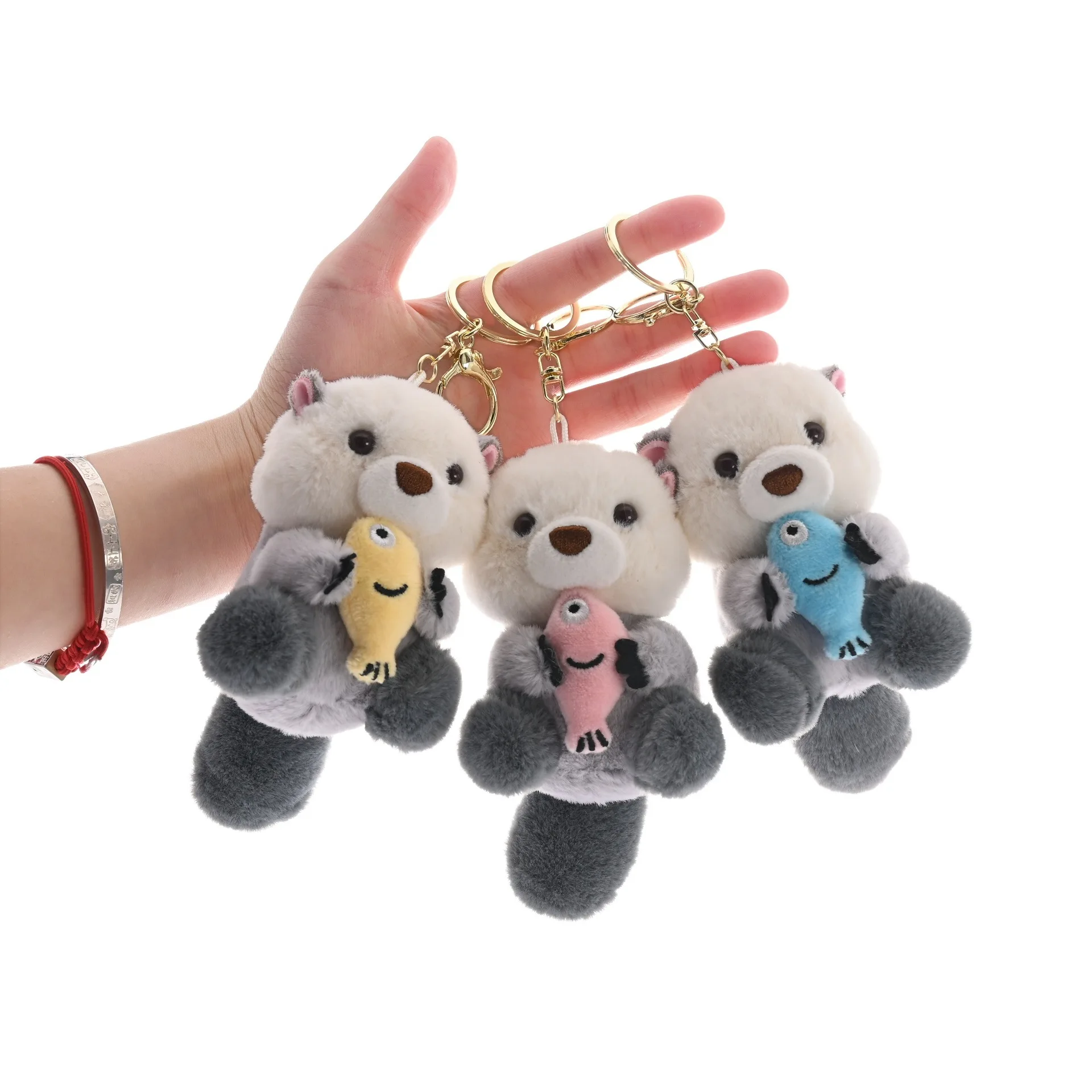 

Creative cartoon fish-holding otter keychain plush couple cute bag accessory doll small gift