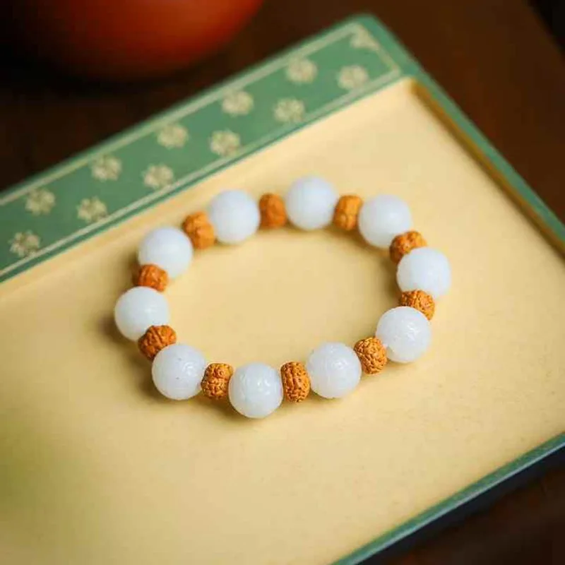 

Натуральный Hetian Цинхай материал Ян толстый класс белый нефрит ретро браслет Ruyi с сертификатом