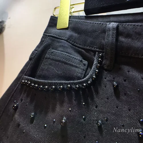 Imagen 2 del producto Pantalones vaqueros de encaje negro europeo, novedad de verano 2025, pantalones vaqueros de encaje huecos de ganchillo con empalme de mezclilla de diamantes calientes con cuentas de industria pesada para mujer