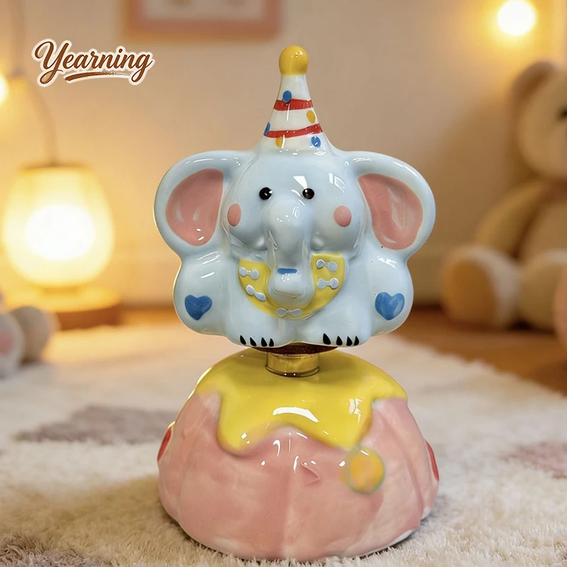 

Jingdezhen Ceramic Rotating Cute Elephant Figurine Modern Home Decor & Car Ornament