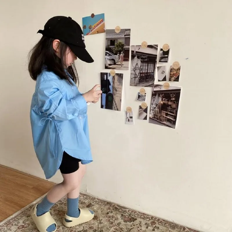 

Children's shirt Spring and Autumn new Korean version girls' thin style western-style personality irregular loose shirt