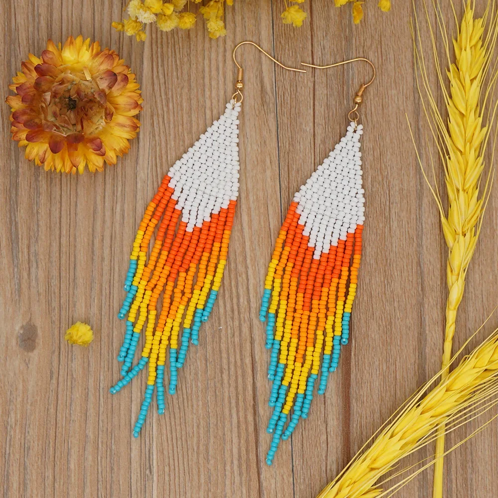 

Fringe Earrings Hand knitting fashion Swallow tail Gradual change Beading Bohemia geometry alloy Rice Bead Earrings