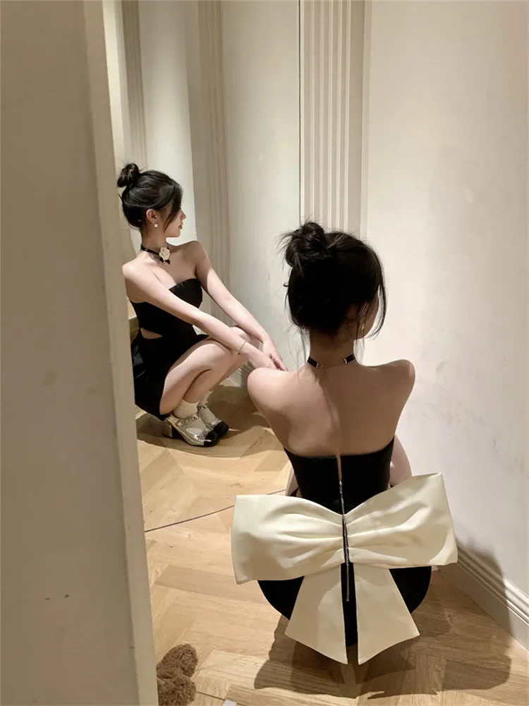 المشاهير سيدة الصيف القوس الكبير الظهر حمالة أسود فستان حفلة صغيرة بلا أكمام المرأة الجوف الخصر قلم رصاص قصير فستان عيد ميلاد