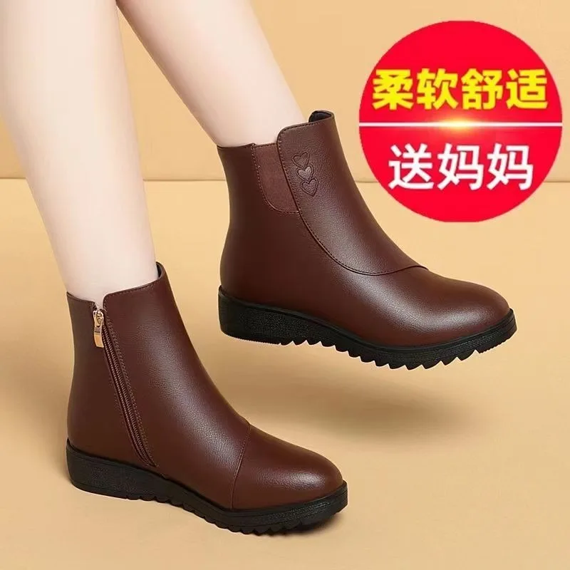 Plana com costura botas modernas dedo do pé redondo sapatos femininos de salto baixo à venda 2025 moda sólida zíper tornozelo botas femininas concisas