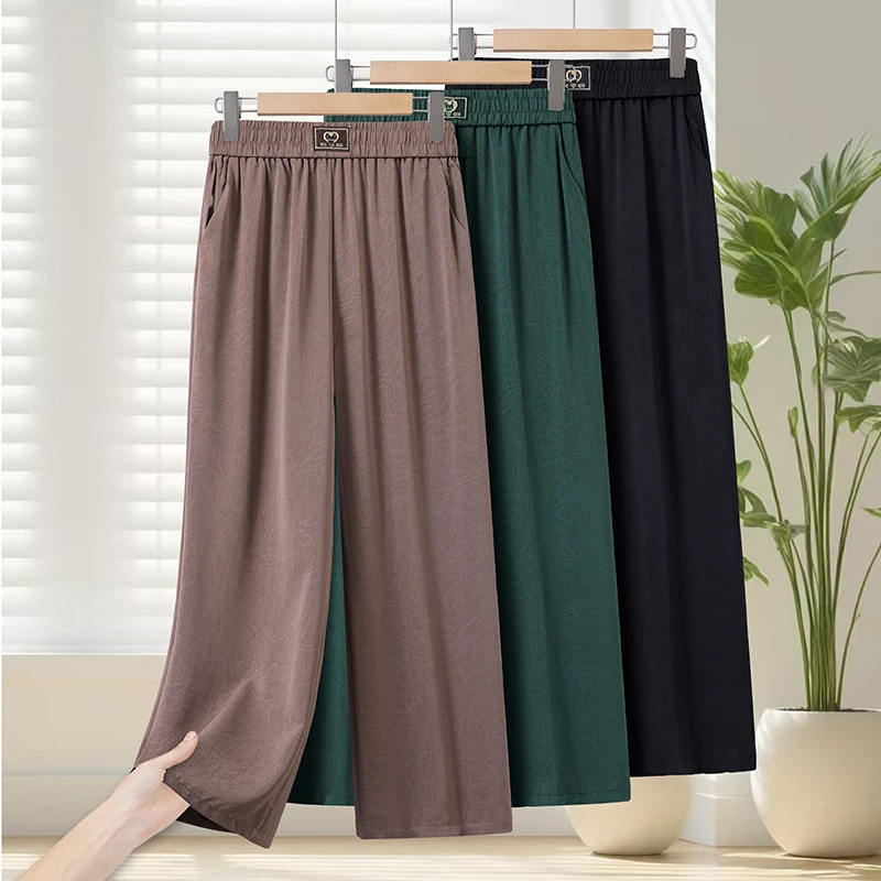 

Женские повседневные брюки больших размеров с эластичным поясом, мягкие и прохладные, высококачественные летние брюки, женские спортивные брюки на каждый день 2026