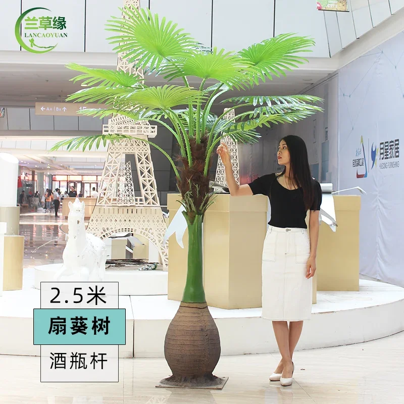 1 coconut tree with a bottle 2.5 meters tall plus 40 leaves, including double customs clearance and taxes, delivered to your doo