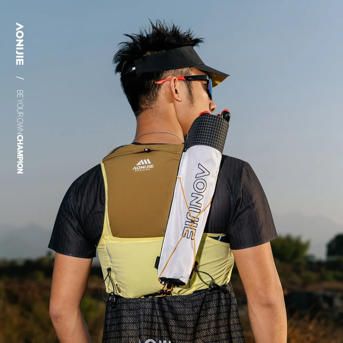 Picture 7: AONIJIE Upgrade MB 8L Lightweight Trail Running Backpack Multi-Compartment Storage with Stick Holder for Hiking Climbing Cycling